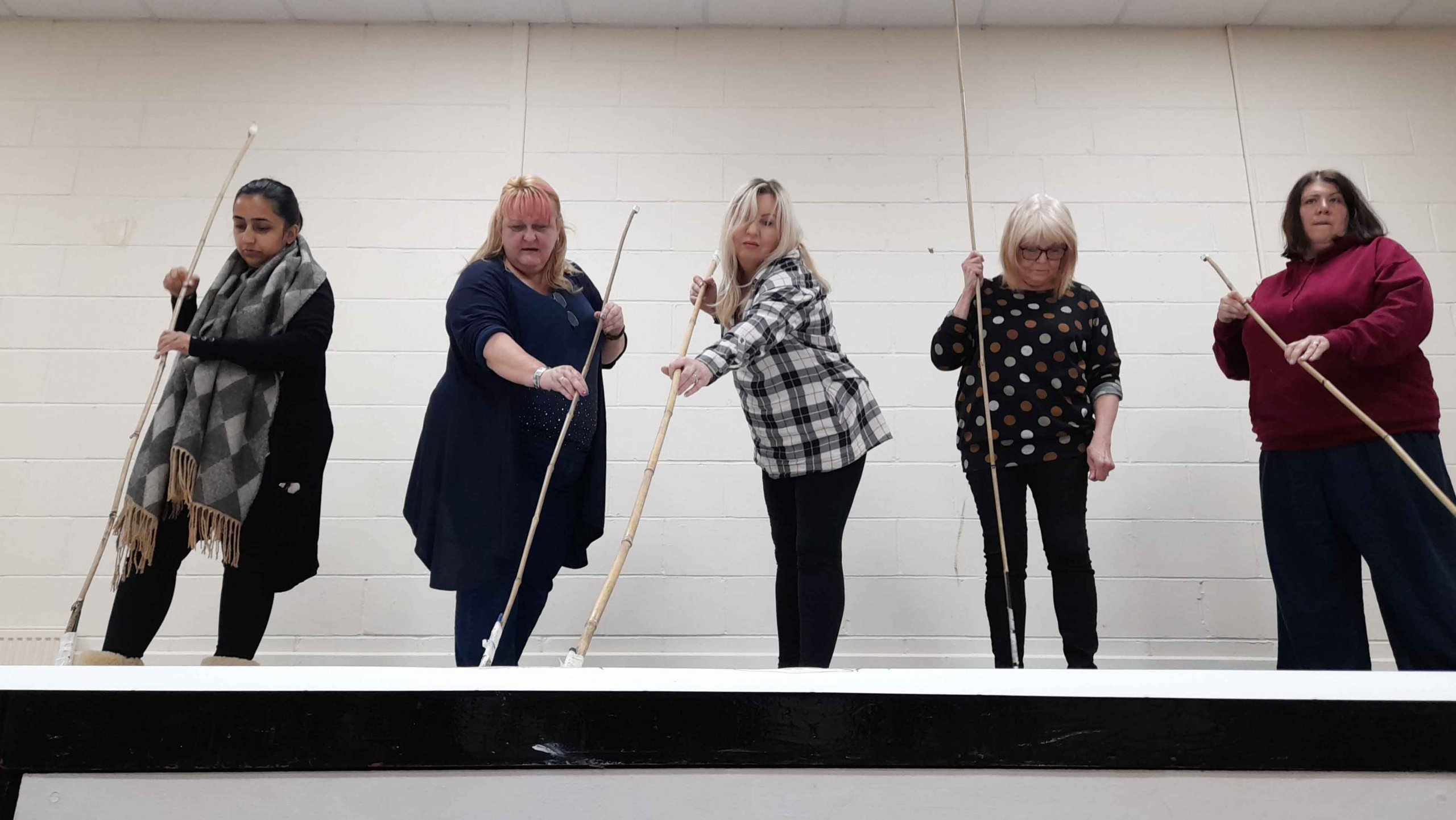 Members of the West Heath Community Centre creating an art piece in preparation for their Jubilee event.